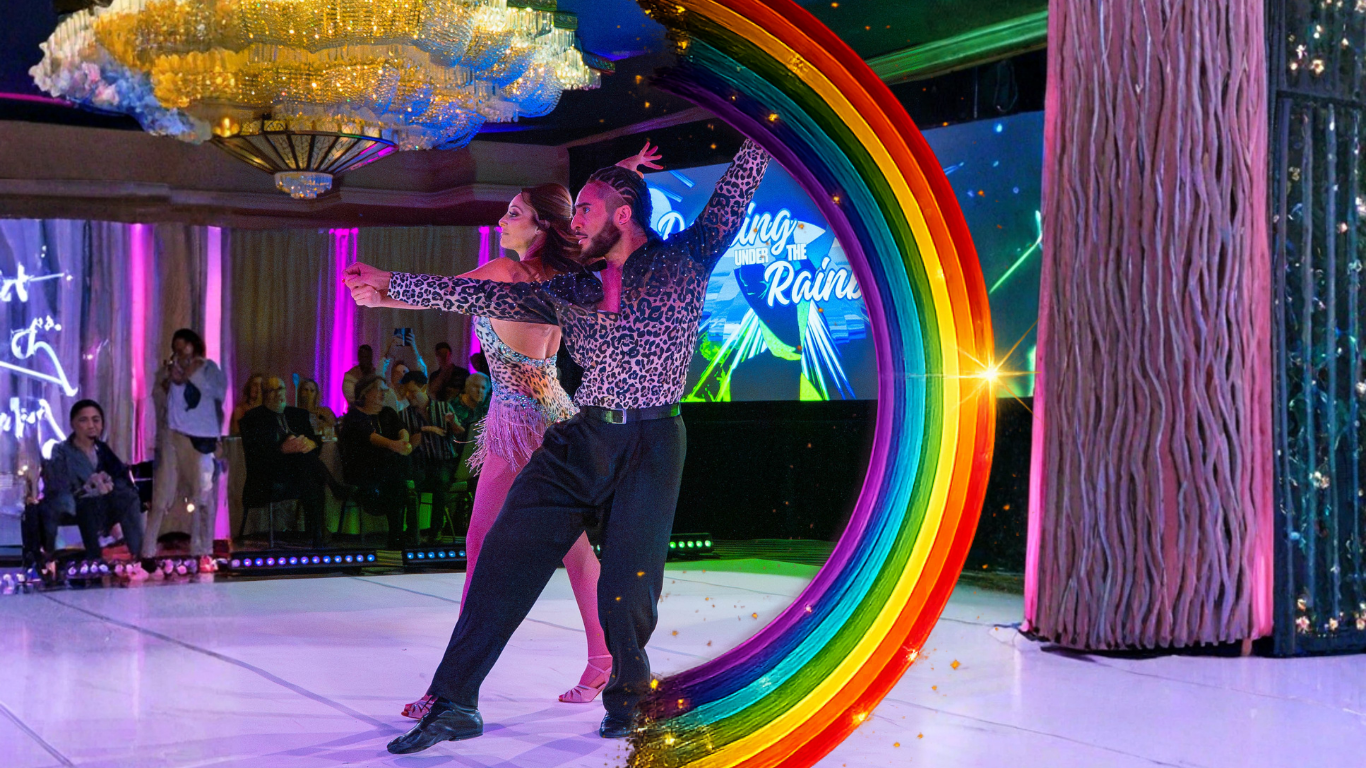 Dancing Under The Rainbow live dance performance with colorful rainbow stage lighting